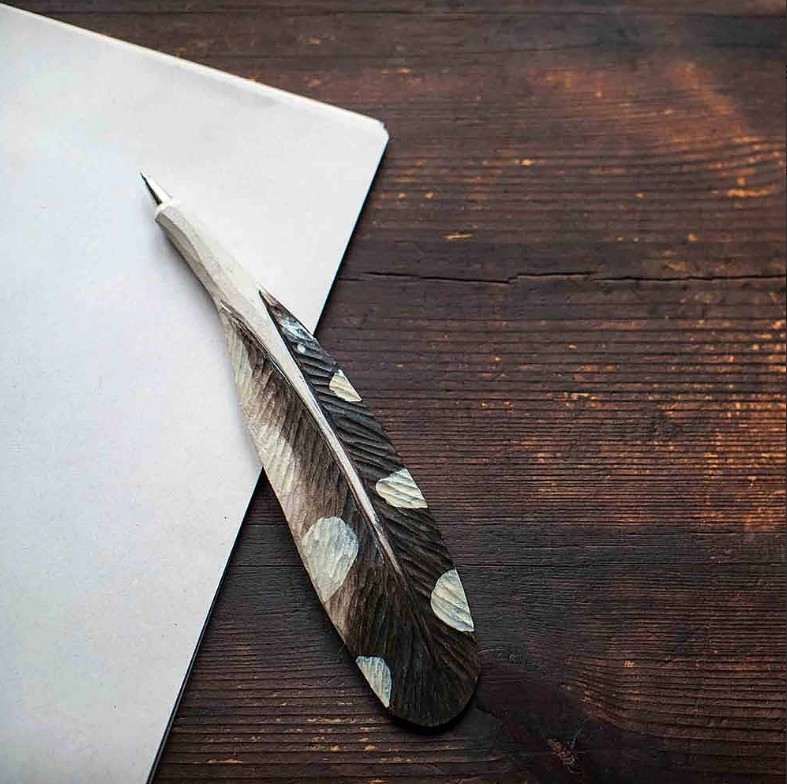 Afbeelding Pen met vogelveerspecht door Tuinadvies.be